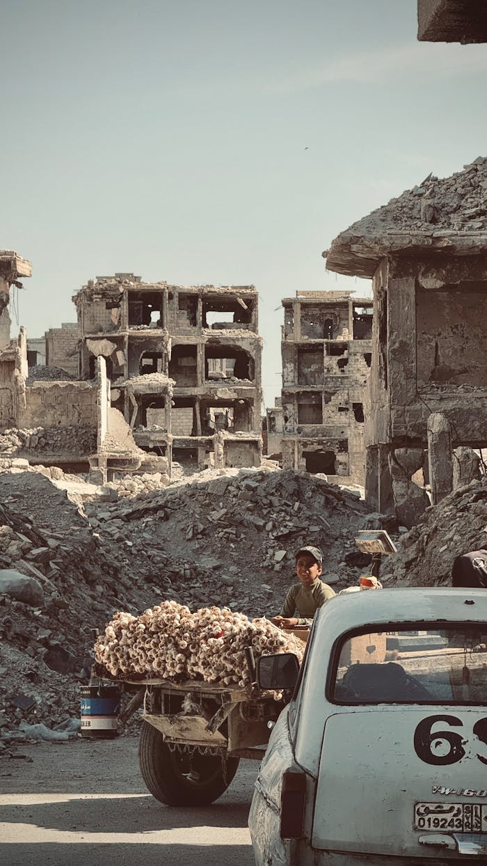 our-services-1 A glimpse into life amid the ruins of war-torn Damascus, Syria, showing resilience and survival.